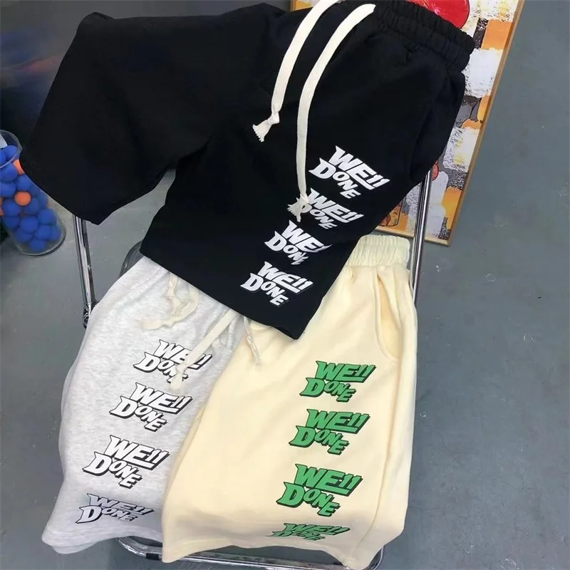 

High Quality WE11DONE Shorts Foam Multi Letter Logo Trend Men Women 1:1 Pants