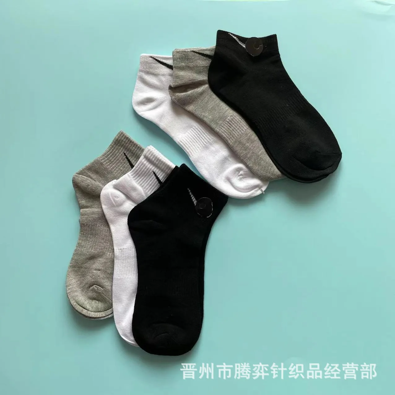 

Suwan Nexter cotton socks black and white gray mid-tube solid color men's and women's sports socks short tube socks