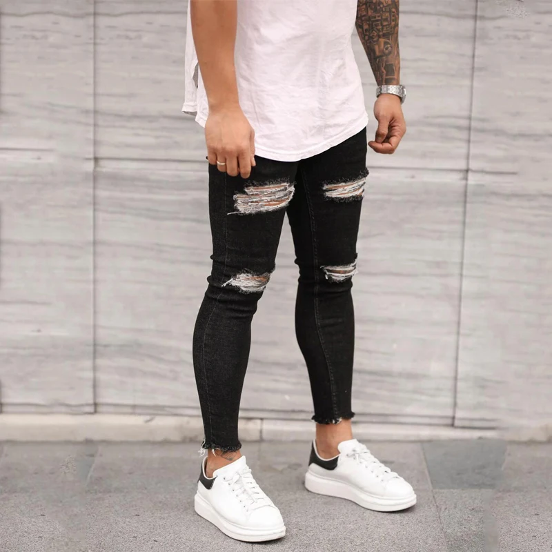 European and American new men's ripped elastic skinny skinny jeans torn nine-point jeans Youth fashion trend casual trousers