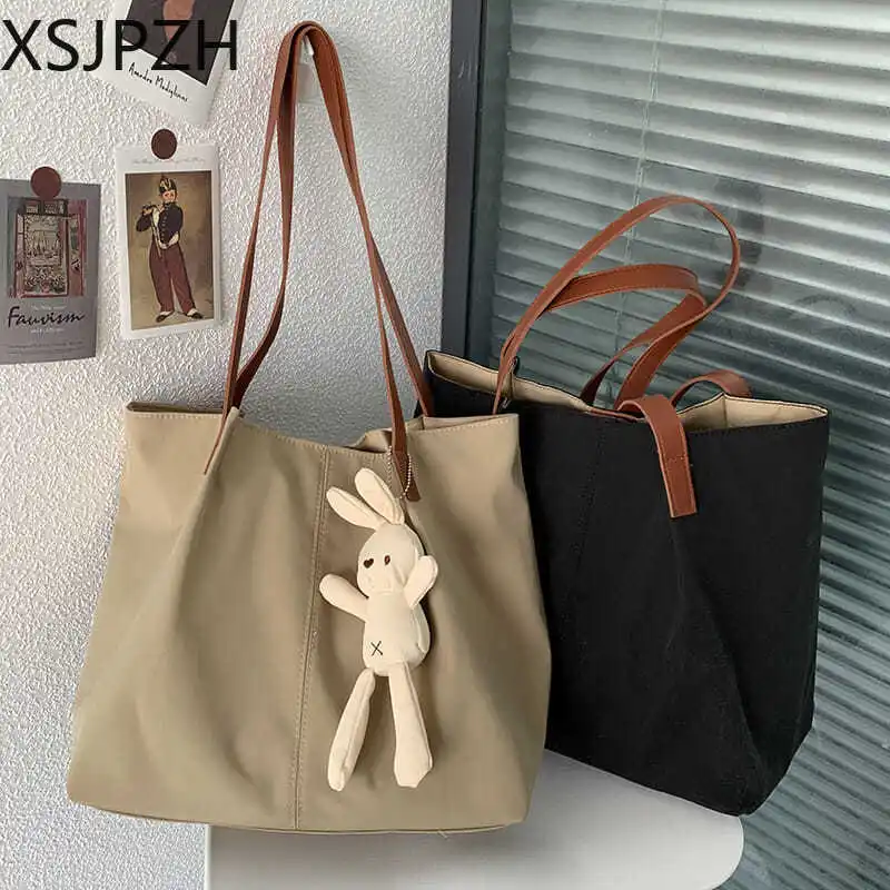 

2023 New Ins Small Fresh Port Breeze Blank Simple Nylon Canvas Women's Shoulder Bag Versatile Solid Color Tideway Literature