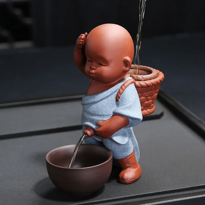 

new purple sand pee spout water spray tea pet decoration little monk tea infuser pissing tea boy