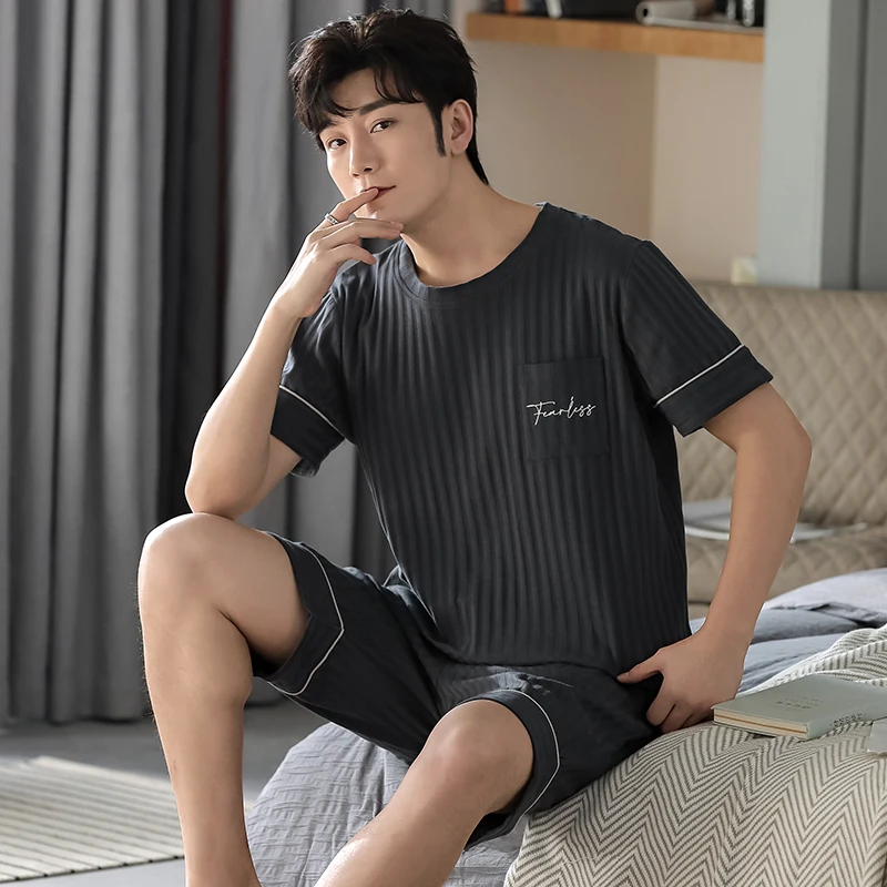 

Men's Pajamas Set Summer Leisure Elastic Waist Loose Leisure Men Cotton Sleepwear with Pocket Men's Short Sleeve Pant Homewear