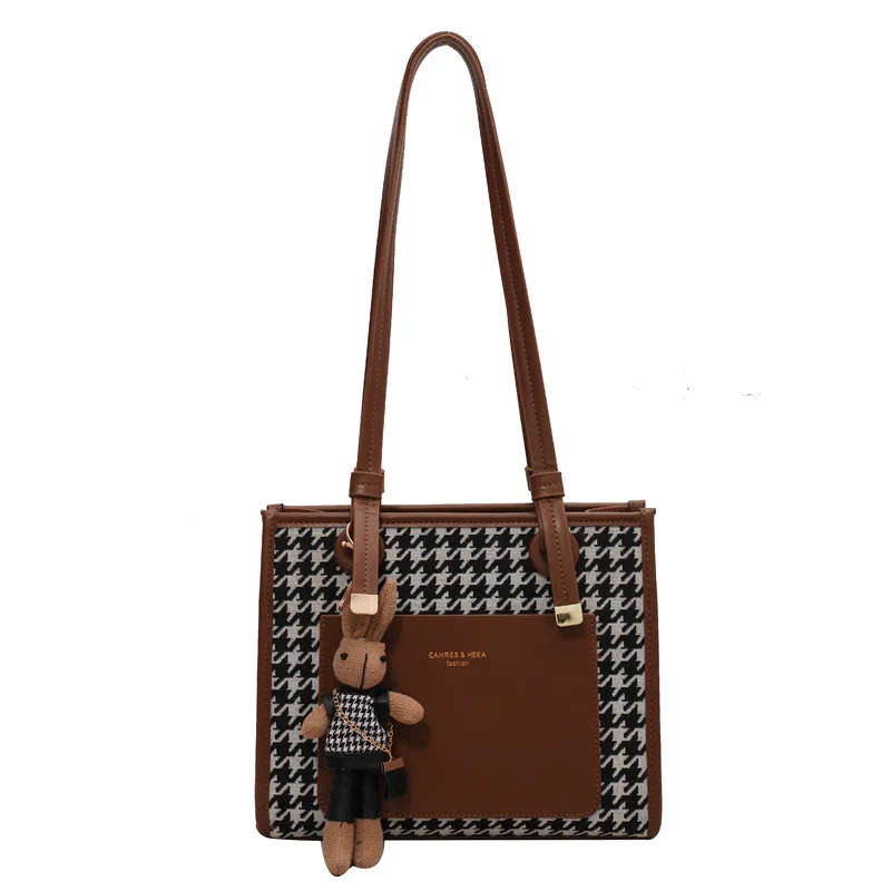 

Женская сумка с рисунком «гусиные лапки»