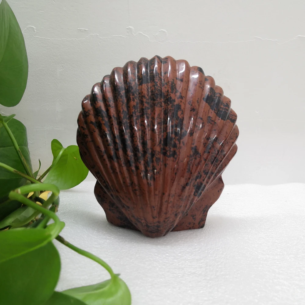 

Amazing Red Obsidian Fluorite Howlite Crystal Animal Shell Carvings