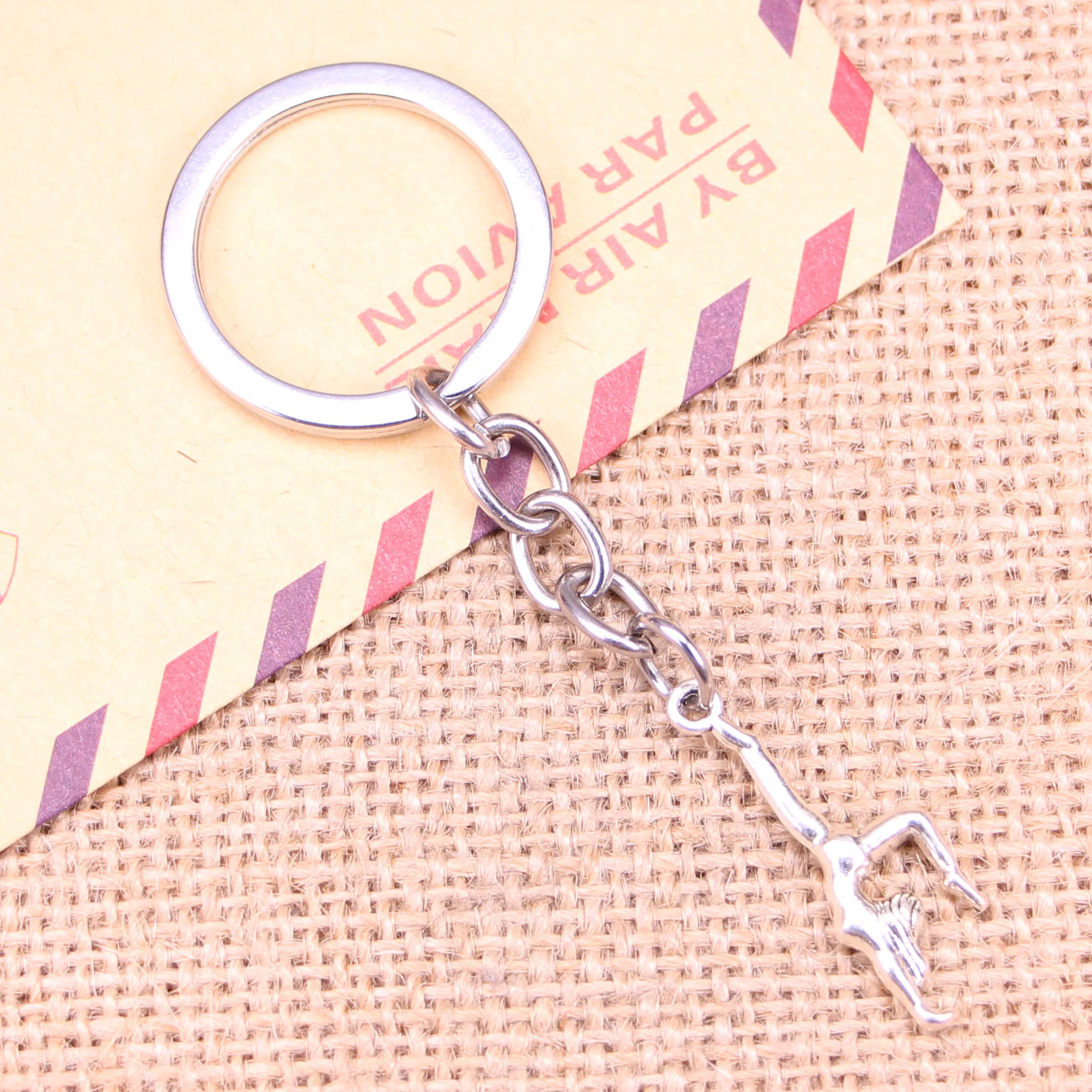 

20pcs New Fashion Keychain 30x11mm gymnastics gymnast sporter Pendants DIY Men Jewelry Car Key Chain Souvenir For Gift