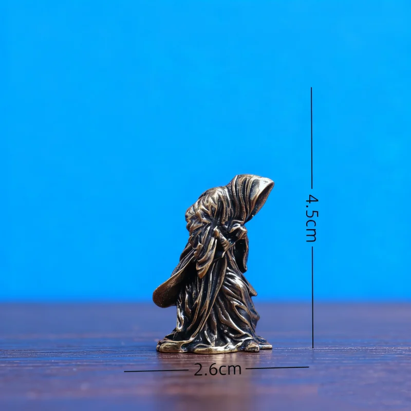 

Латунная статуэтка жнеца