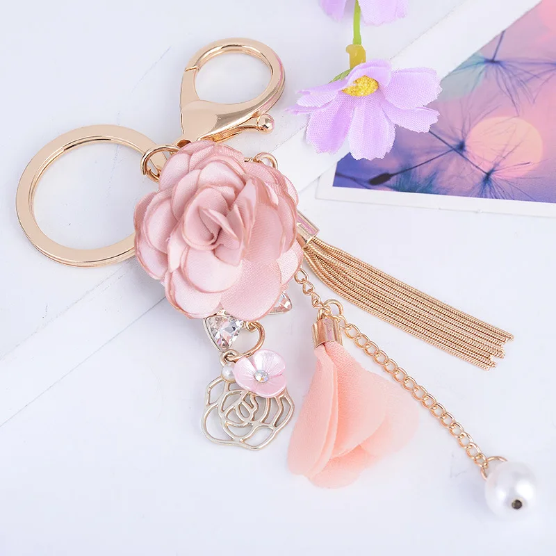 

Korean Small Fresh Keychains Cloth Flower Tassel Keychain Creative Bag Charm Car Charm Women Jewelry Gifts Key Chain Wholesale