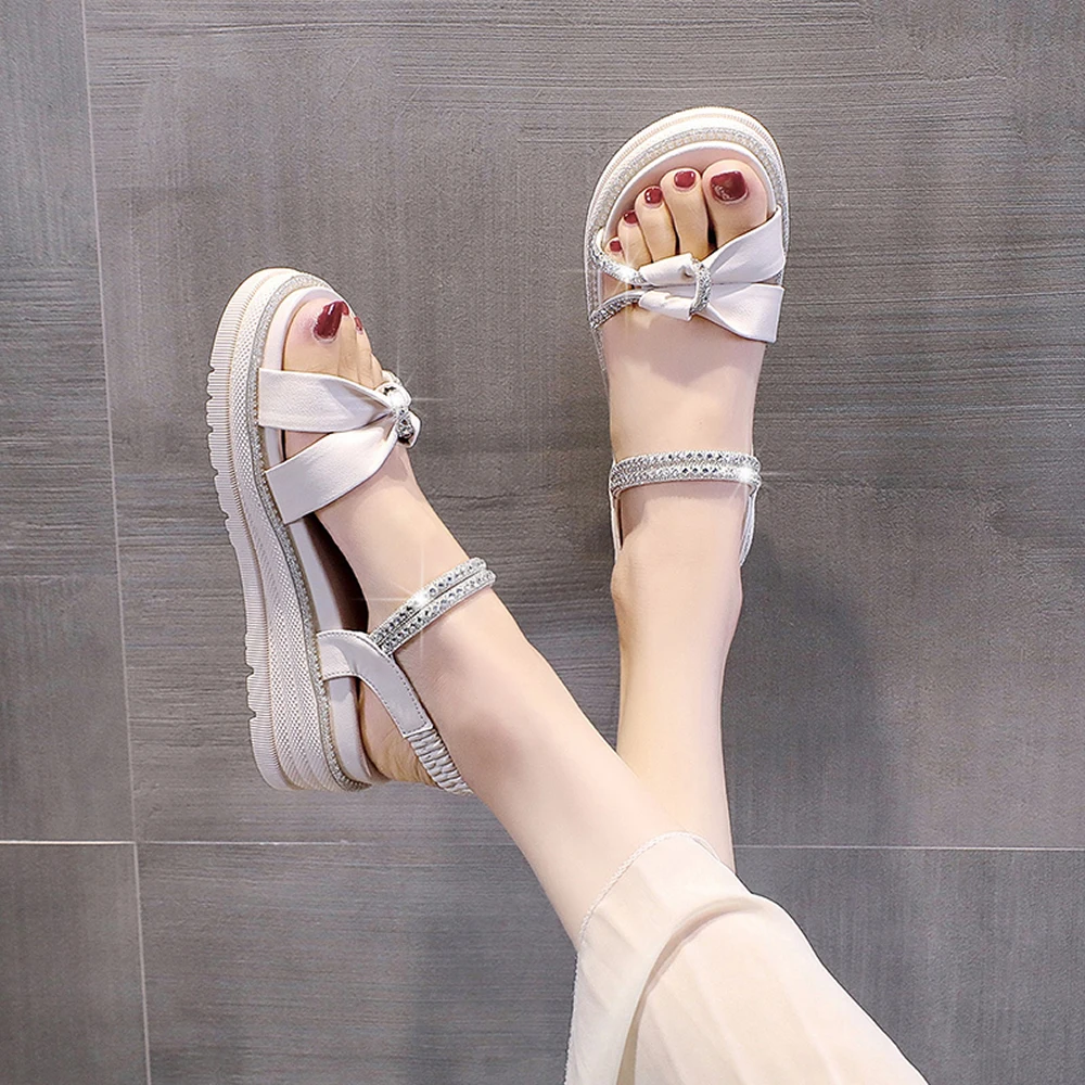 

Thick bottoming rhine-diamond sandals women 2023 all-in-one casual wedge platform shoes fairy wind Roman flat soft sole