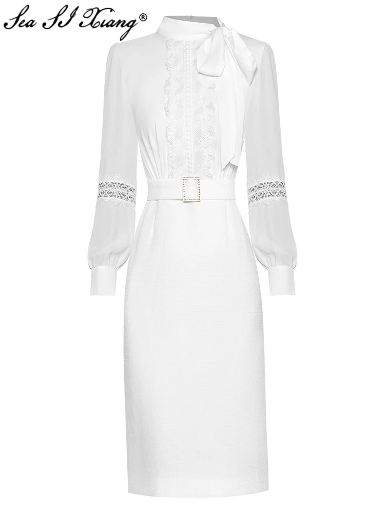 

Женское платье-карандаш с бантом, воротником-стойкой и рукавами-фонариками