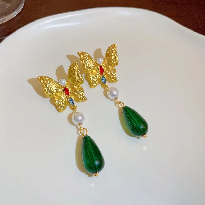 

Silver Needle Middle Ancient Fold Butterfly Pearl Set Diamond Tassel Earrings Feminine Network Red Personality Earrings