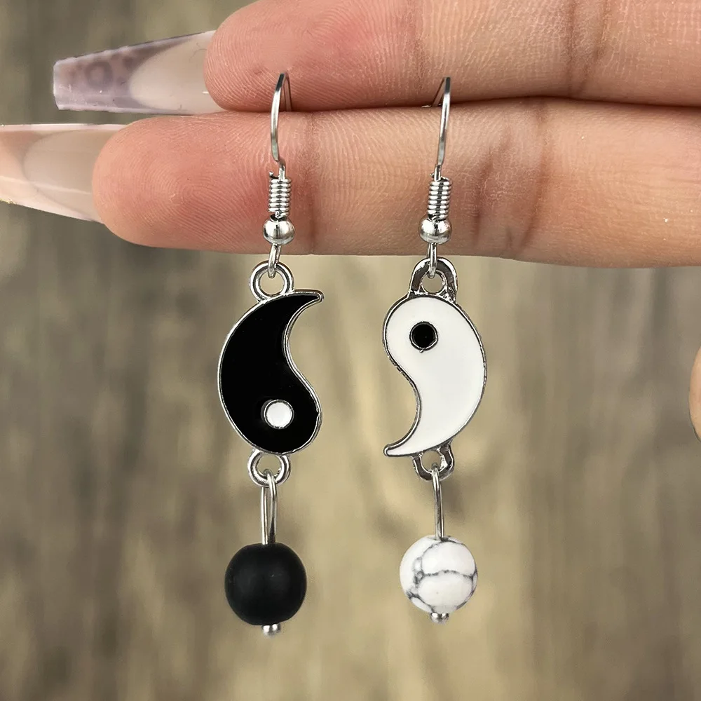 

2023 Europe America Cross border New Personalized Oil Dropping Black and White Tai Chi Bagua Earrings Fashion Symmetric Earrings