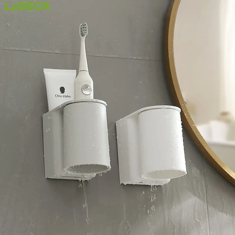 

LoDECK Wall mounted tooth cup toothbrush rack without punching wall mounted toothbrush rack Magnetic upside down toothbrush cup