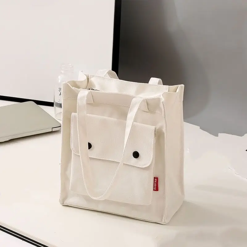 

Fresh and exquisite shoulder tuition bag Canvas material large -capacity simple literary tuition bag Student supplies
