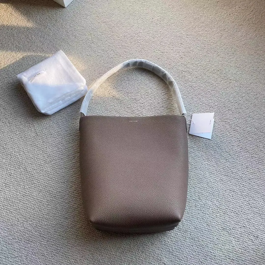 

Женская сумка-мешок из воловьей кожи с зернистой текстурой личи