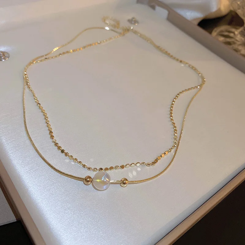

2022 Korean New Exquisite Pearl Chain Multi-layer Necklace Women's Fashion Temperament Simple Versatile Clavicle Chain Necklace
