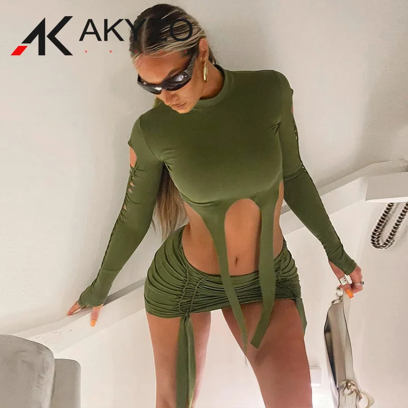 

Женский комплект из двух предметов с юбкой и топом с длинным рукавом