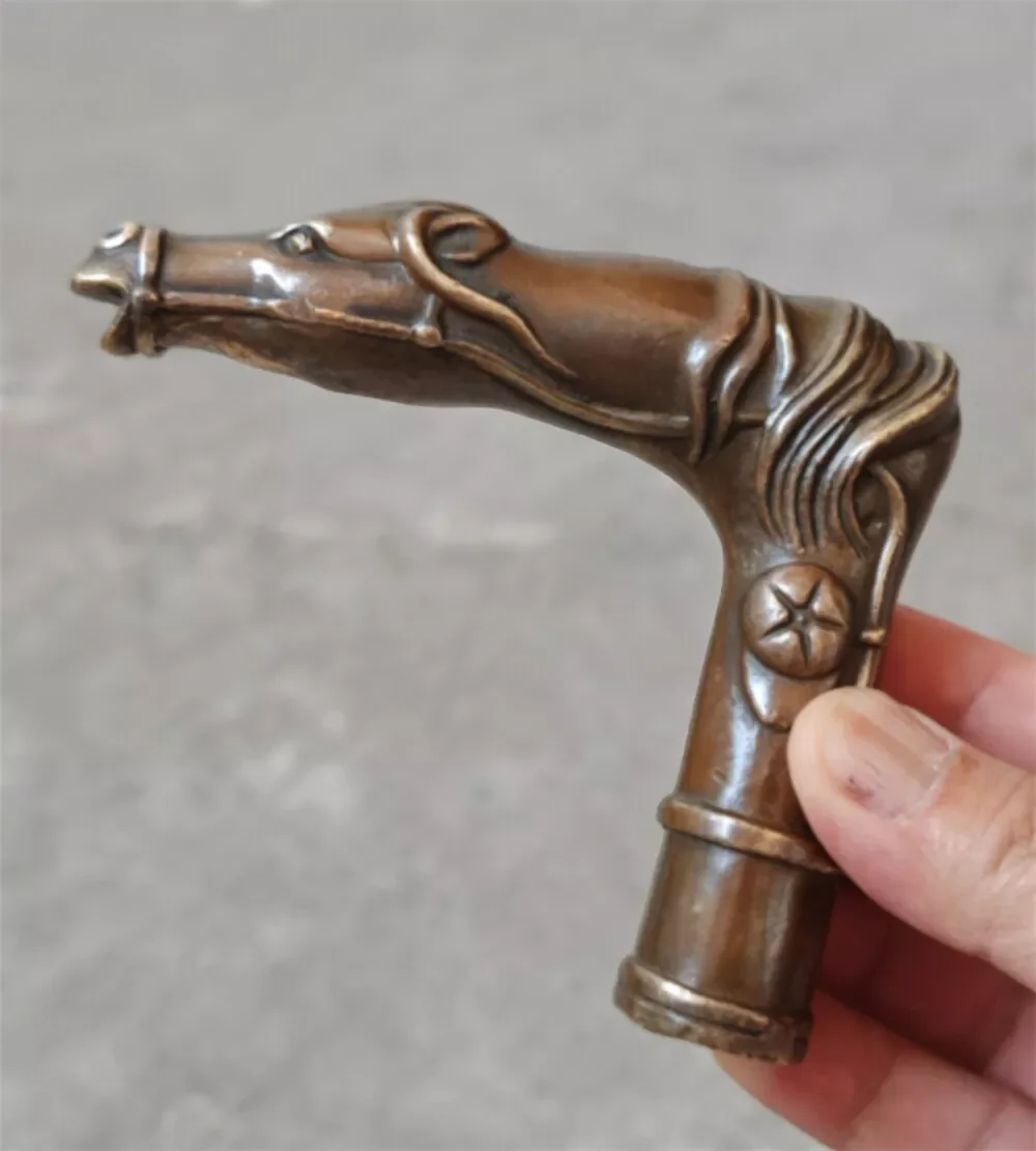 

Антикварная бронзовая статуэтка головы зверя