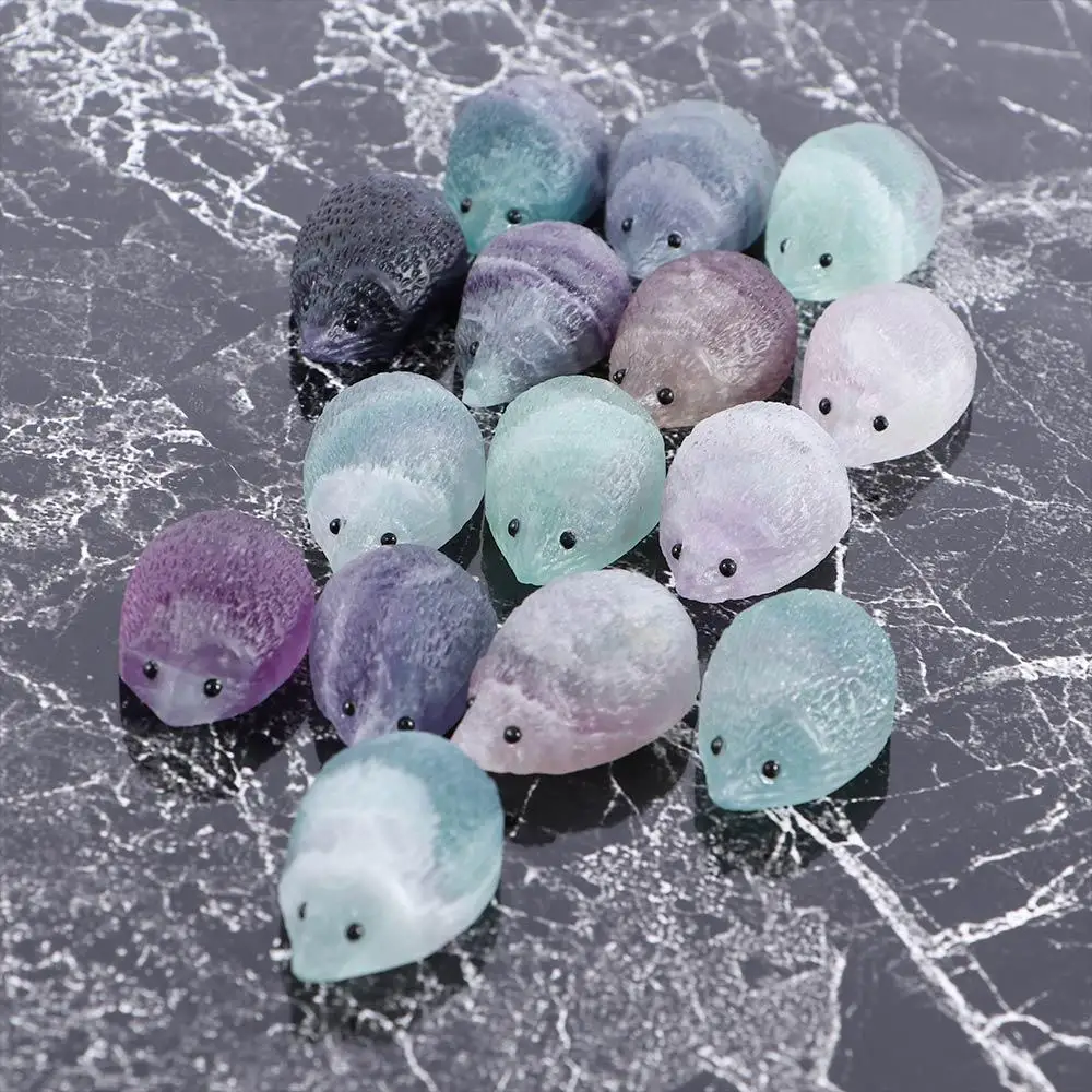 

Радужный флюоритовый ёжик из кварцевого кристалла