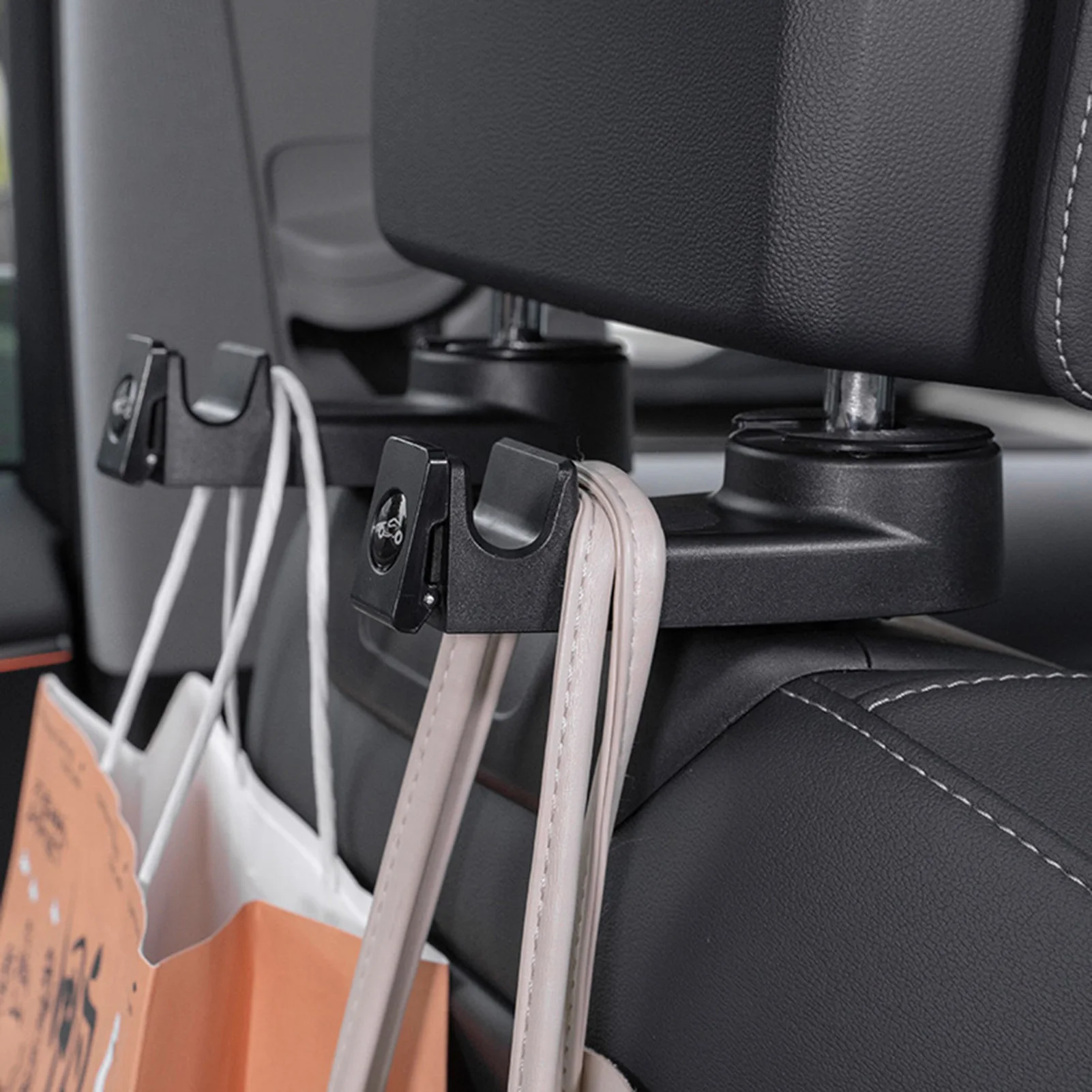 

Car Headrest Hooks Multifunctional With Phone Holder Falling Resistance Car Backseat Hooks Space Saving Seat Hanger For Bags