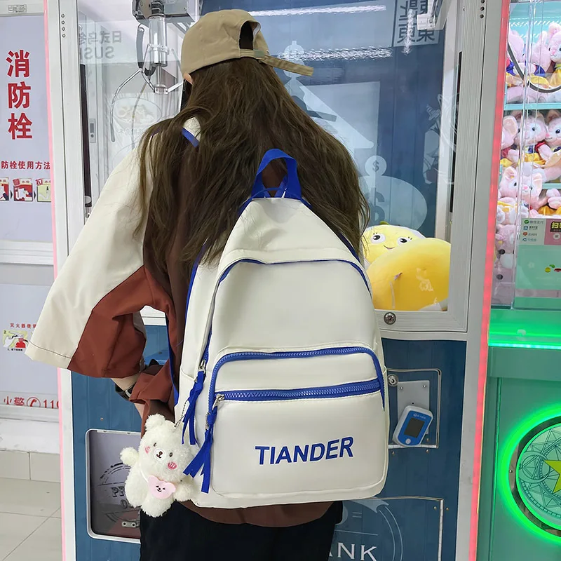 

Simple Female Students Backpack Women Nylon School Bag For Teenage Girl Cute Pendant Casual Shoulder Bag High Quality Travel Bag
