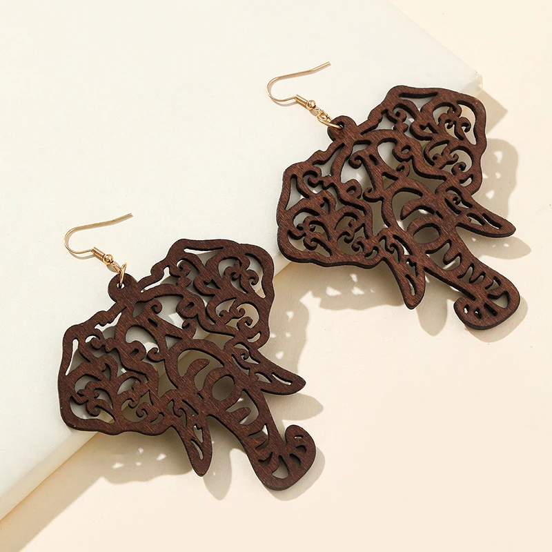 

Женские деревянные полые абстрактные Резные узоры серьги в форме капли воды Женские повседневные ретро этнические серьги женские серьги