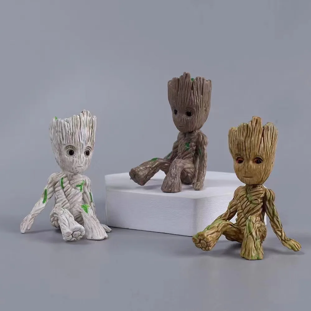

New Disney Tree Man Groot Guardians of The Galaxy Avengers Anime 6cm Mini Toys Action Figure Sitting Groot kids Toys