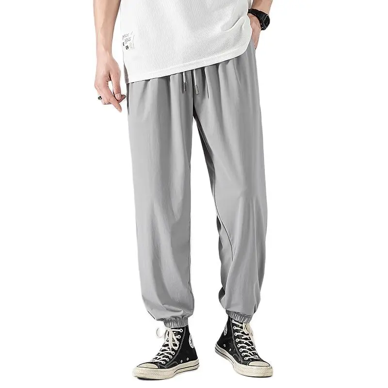 New Korean Fashion Trend Men'S Summer Thin Elastic Loose Harlan Pants Youth Handsome Student Ice Quick Drying 9-Point Trousers