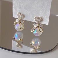 allnewme fairy ab color simulated pearl drop dangle earrings for women shiny cz stone gold color love heart bowknot earring