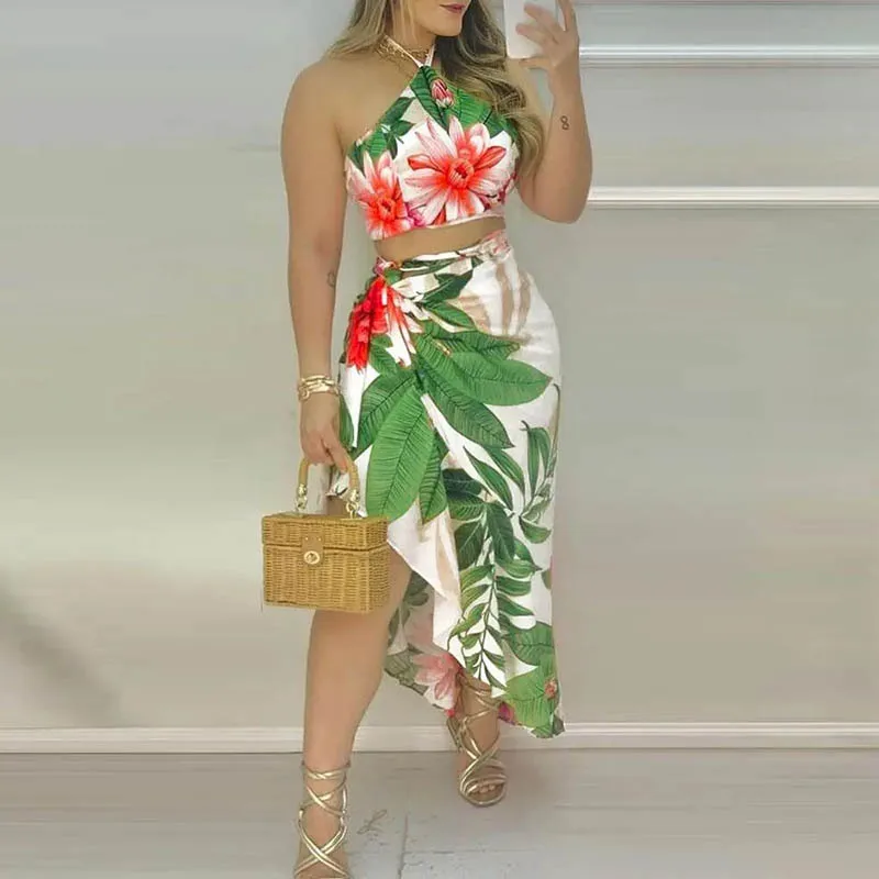 

2022 Women Casual All Over Floral Print Halter Lace Up Sleeveless Crop Tops Ruffle Asymmetrical Skirt Maxi Vacation Skirt Sets