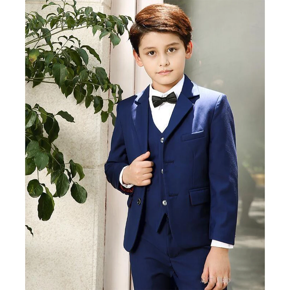 мальчик в синем костюме. строгий костюм для мальчика. синий костюм детский мальчику. костюм на мальчика 7 лет. синие классические костюмы для мальчиков.