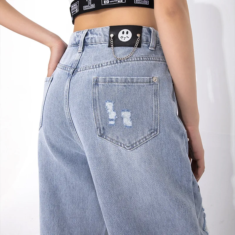 Women's spring and summer new original trendy INS personality graffiti rivets printed hole grinding white straight jeans