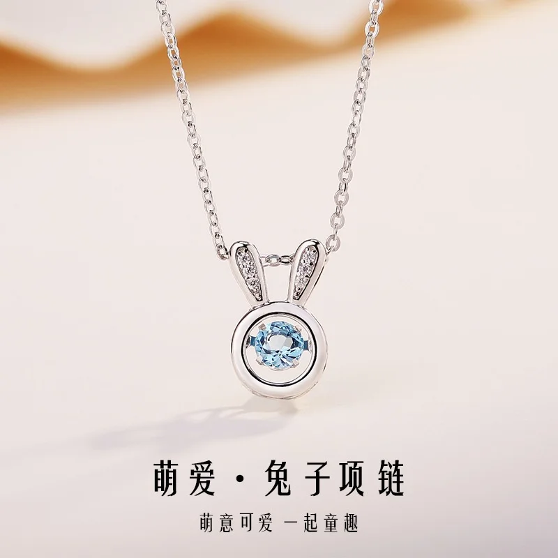 

Ожерелье из серебра 925 пробы с кулоном в виде кролика и голубым топазом