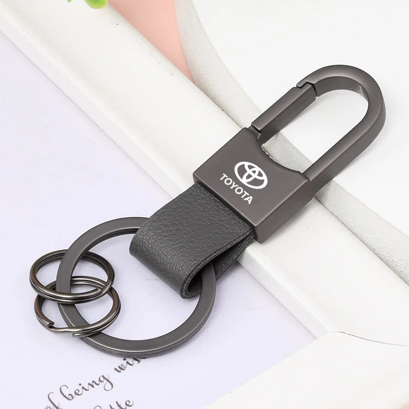 

Автомобильный винтажный кожаный брелок для ключей из цинкового сплава для Toyota Hilux Aygo Yaris Ractis Corolla Camry CHR Auris Tacoma Cruiser