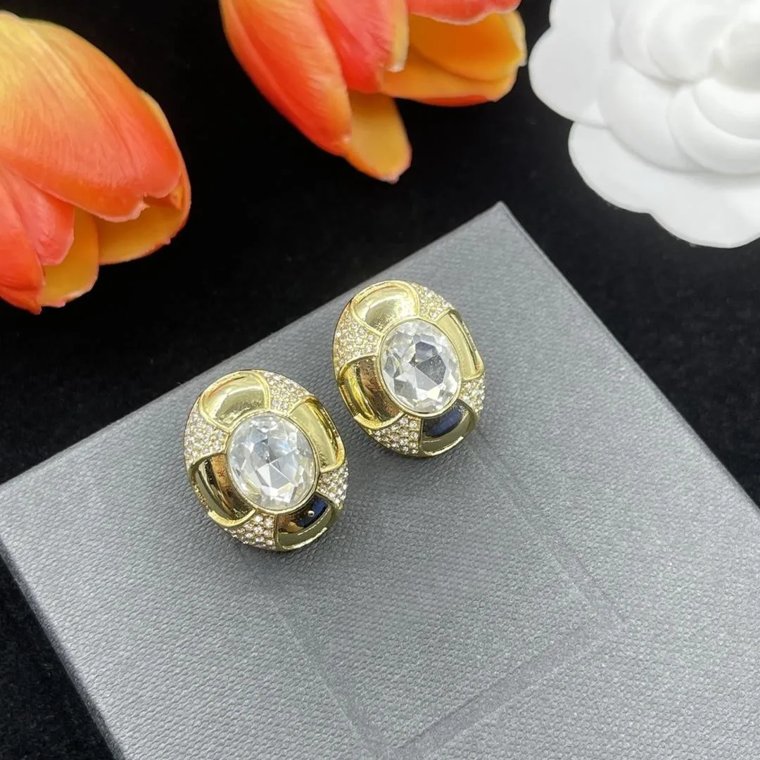 

Fashionable and exaggerated geometric drop glaze oval gemstone design, light luxury earrings