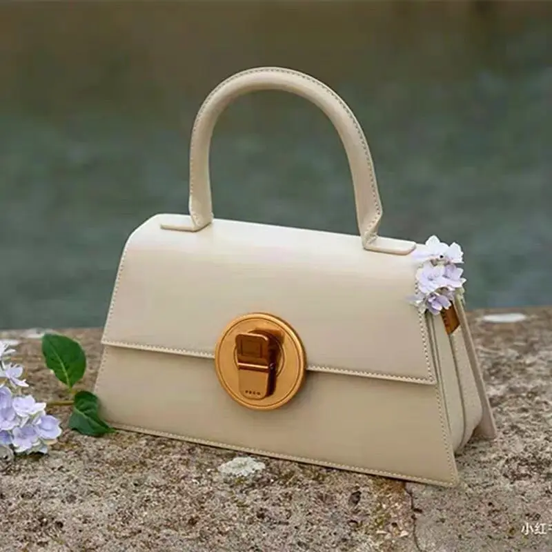 

Высококачественные сумки из натуральной кожи для женщин 2022 бутик универсальная нишевая светильник роскошная сумка-мессенджер на одно плеч...