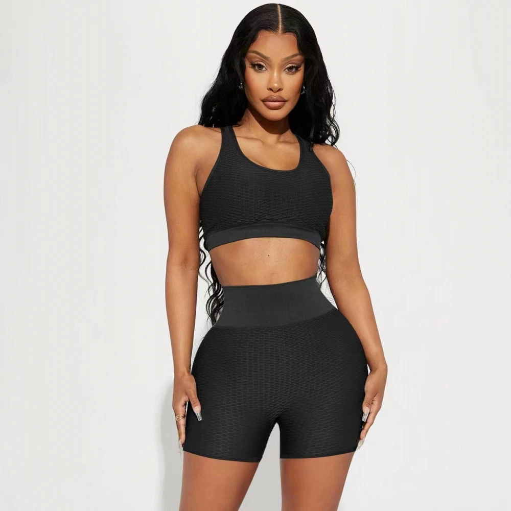 

Женский спортивный костюм из двух предметов: футболка без рукавов и шорты