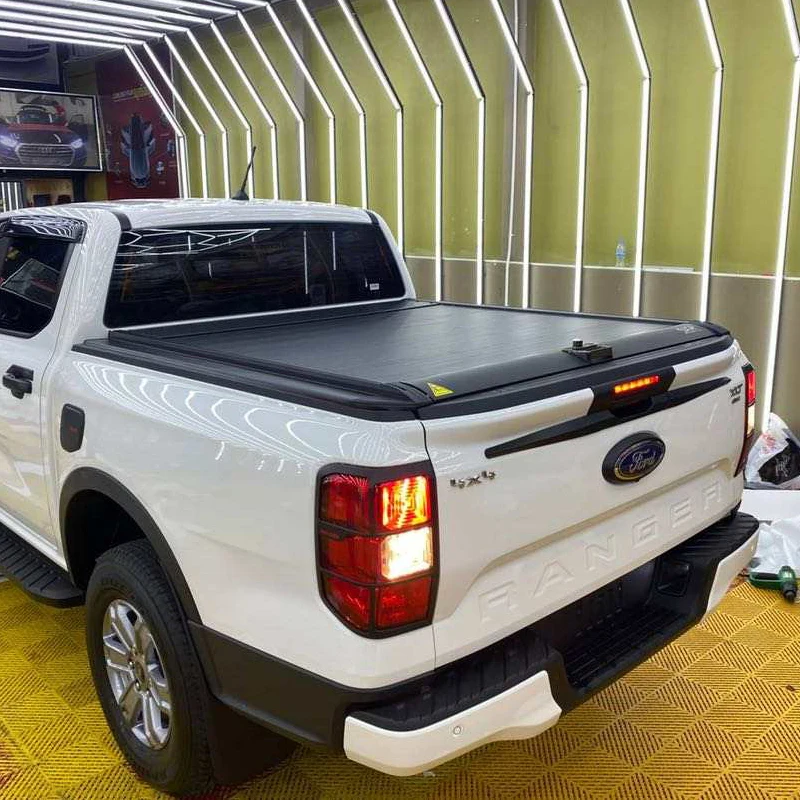 

High Quality Aluminum manual pickup truck bed retractable roller lid Tonneau Cover For Amarok Hilux Ranger NP300 Triton Dmax