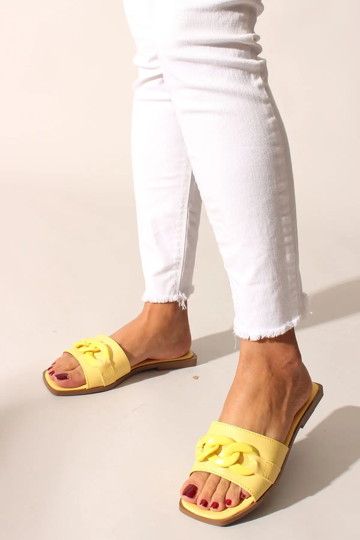 

Yellow skin women slippers
