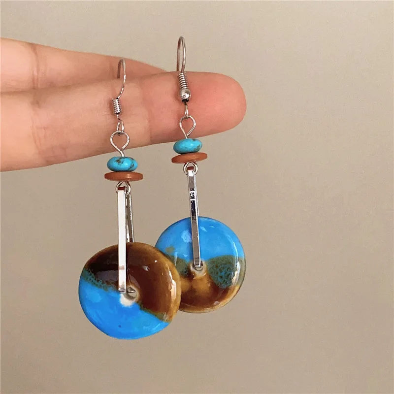 Серьги-гвоздики в европейском и американском стиле с синими камнями