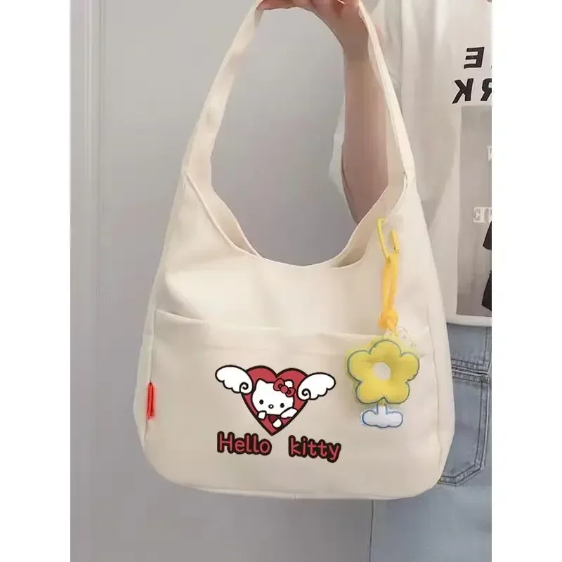 

Sanrio Hello Kitty Purses 2023 New Hand Bag Lunch Bag Women's Handbag Canvas Cute Cartoon Printing Large Capacity Women Bag