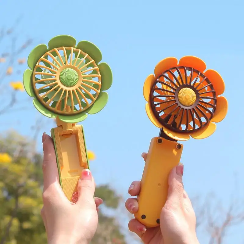 

Портативный складной электрический вентилятор в форме подсолнуха, портативный, для студенческого общежития и офиса, перезаряжаемый, вмест...