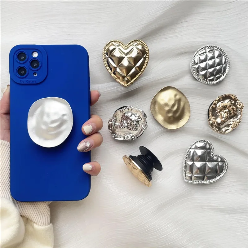 

2PCS Plating metal silver gilt edged three-dimensional airbag bracket creative lazy retractable folding mobile phone rack