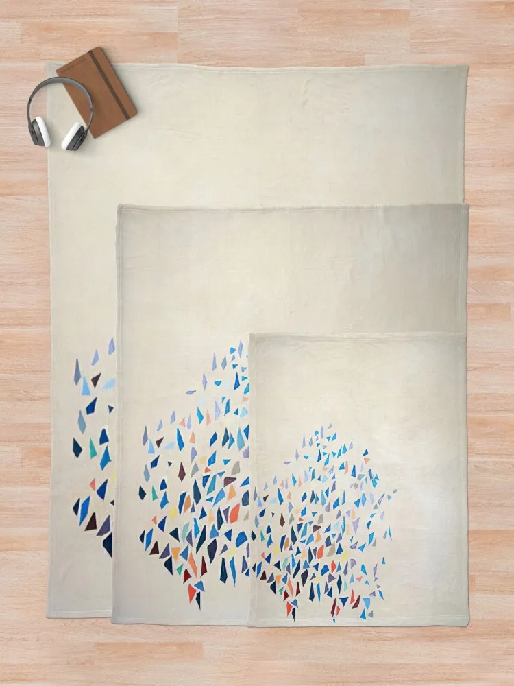 Цветные формы - Одеяло Robert Goodnough в клетку на диване. Свободные одеяла.