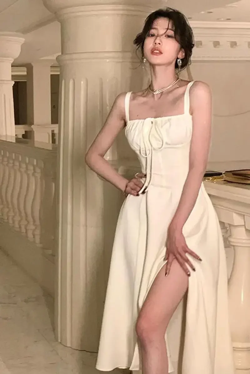 Элегантное французское белое платье миди на бретелях лето 2023 новое повседневное