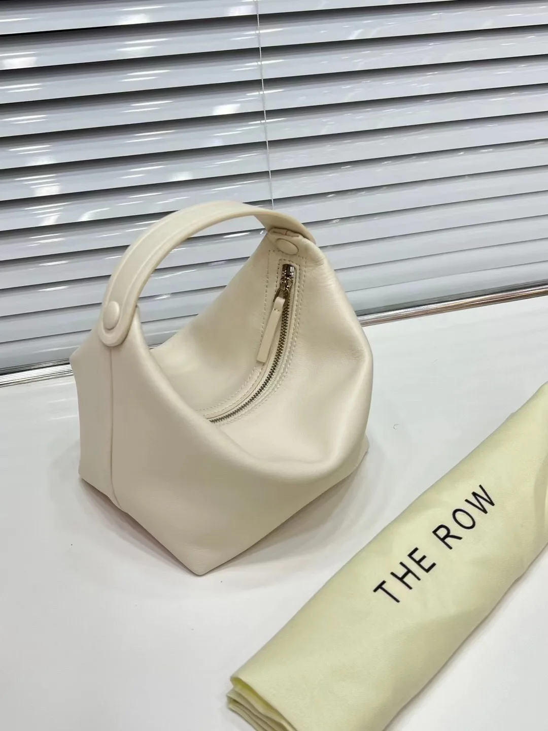 

2023 Designer luxury ladies genuine leather bag THE ROW cowhide mini the handbag the row Lcu Les Bains bags for women