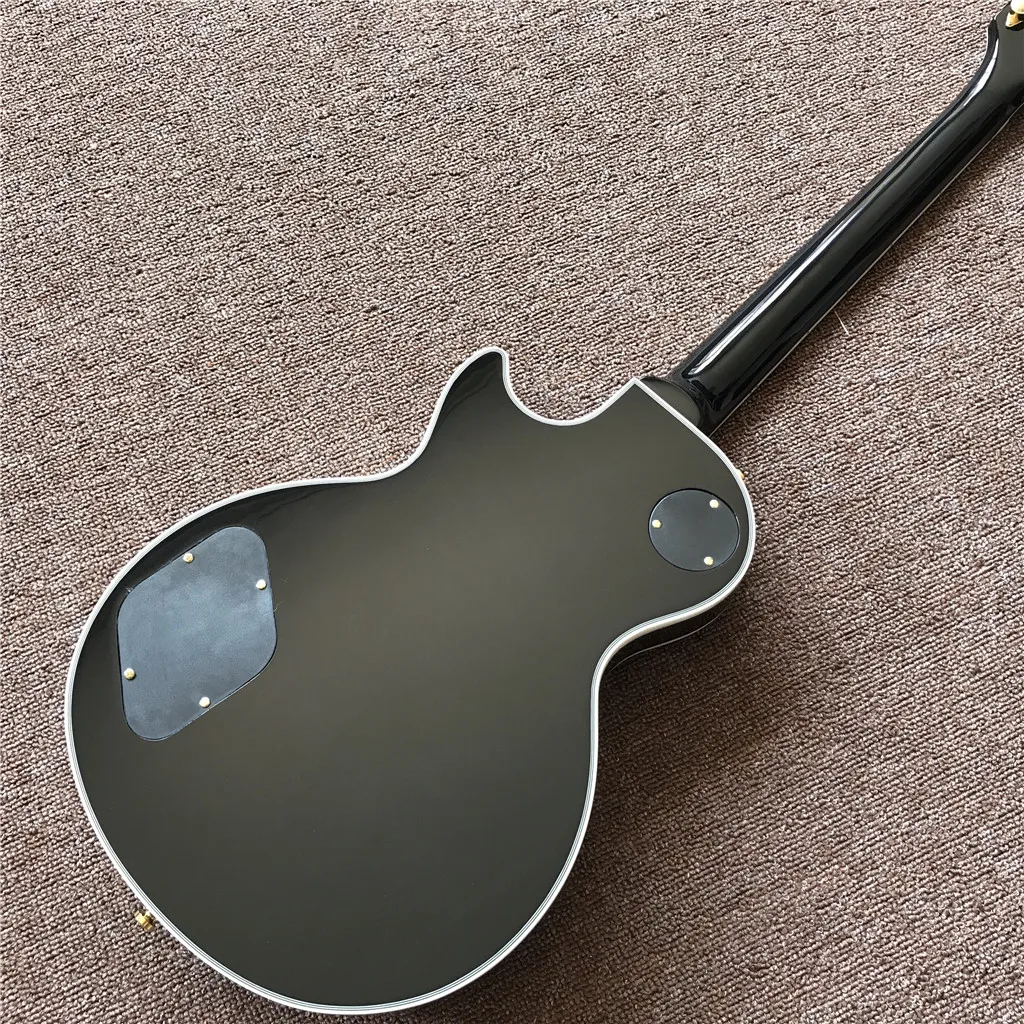 Новое поступление электрическая гитара с черным грифом и золотистым корпусом