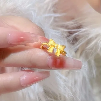 Женское золотое кольцо с бантом Boutique AU999