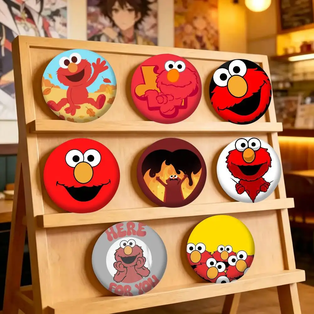 Фото Милые мультяшные значки E-Elmo 25, 32, 44, 58, 75 мм, персонализированные круглые броши-пины, аксессуар, подарок №1