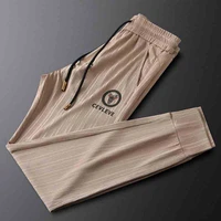 light luxury neutral color authentic badge casual sports pants mens summer thin soft mens elastic sweatpants