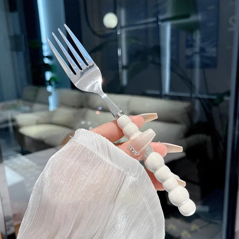 

Вилка из нержавеющей стали с жемчужной ручкой